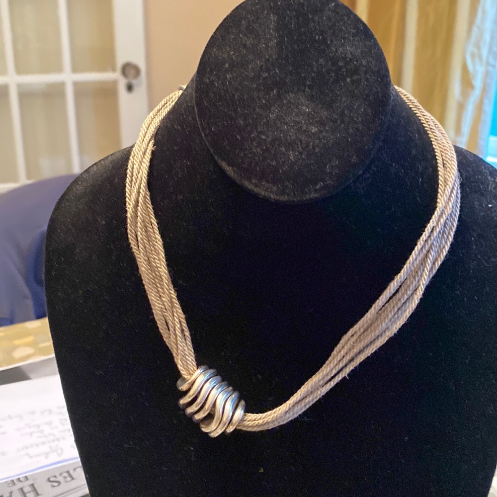 Whimsical metal and cord French necklace